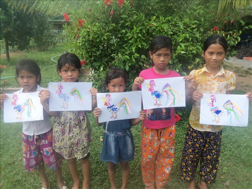 Girls and their roosters.