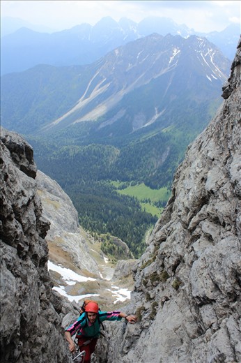 Climbing up a famous Italian  'via Ferrata' on Dolomite mountain Cliffs