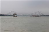 The Howrah Bridge is a cantilever bridge with a suspended span over the Hooghly River in West Bengal, India. Commissioned in 1943, the bridge was originally named the New Howrah Bridge, because it replaced a pontoon bridge at the same location linking the two cities Howrah and Kolkata (Calcutta) . In the year 1965 it was renamed Rabindra Setu, after the great Bengali poet Rabindranath Tagore. However it is still popularly known as the Howrah Bridge.: by rup_sikder, Views[1364]