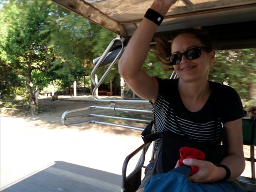 Tash on the back of a car tuk tuk