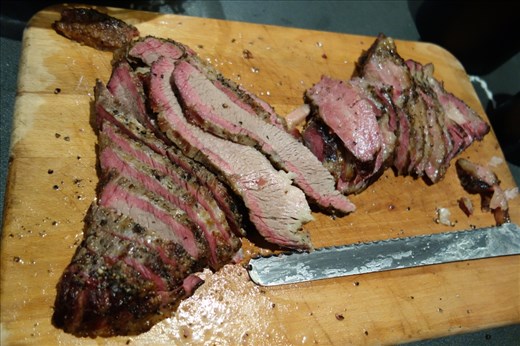 Finished brisket, cut around the deckle. Note the smoke ring.