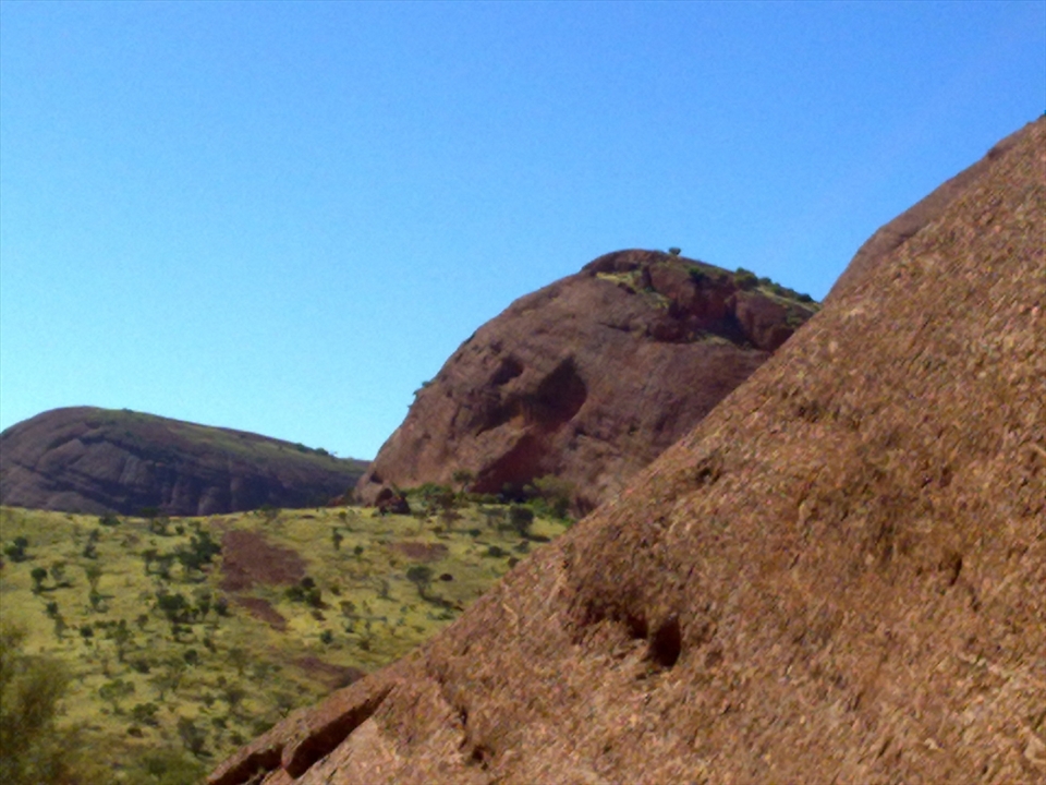 Standing ontop of the world, well atleast it felt like it. These are the rock formation know as 'the olgas' and boy they were high up