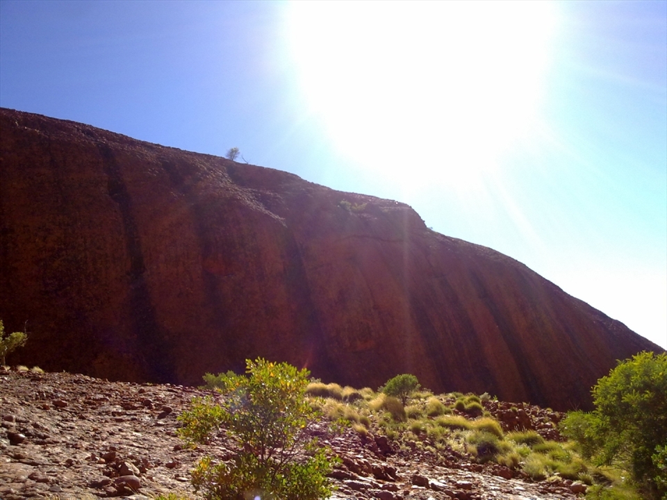 Up close with the famus Ayers rock or 'Uluru' the sheer cliffs of this rock is truly breath taking.