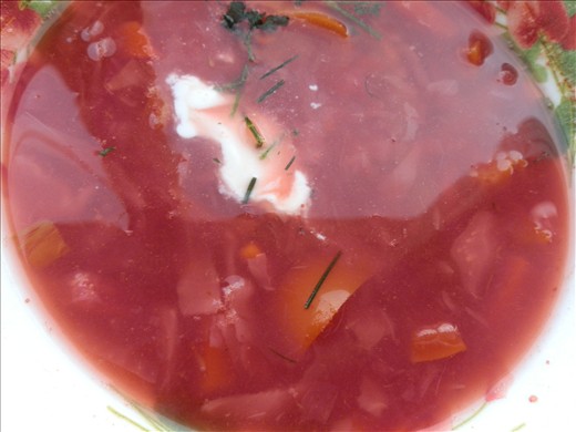 Borsch with sour cream and greens