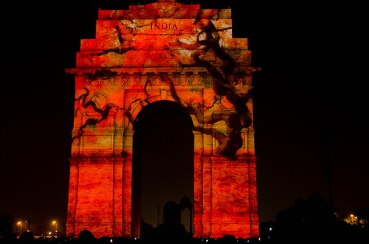 Originally known as the All India War Memorial, India Gate is the national monument of India, situated in the heart of New Delhi. Picture was taken during the celebration of 60th Anniversary of Japan-India Diplomatic Relations. Bit dramatic and loud in colors.