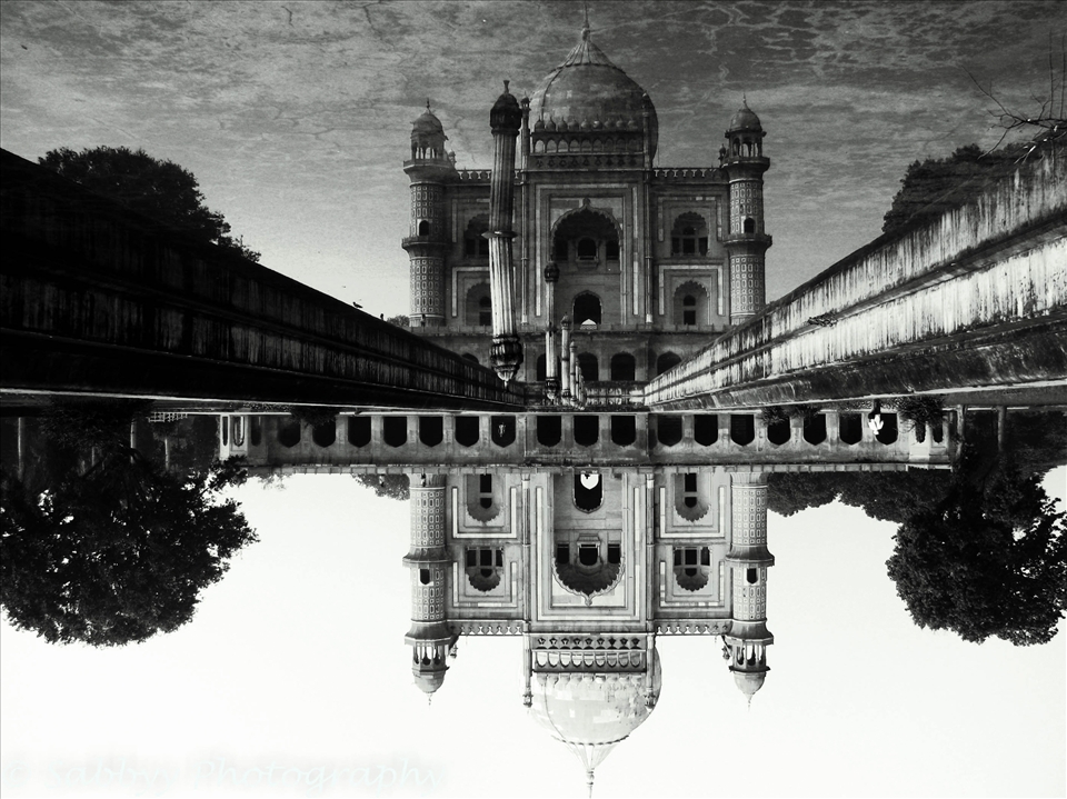 I turned my world upside down and they say I am a crazy explorer. Safdarjung's Tomb is a garden tomb with a marble mausoleum in New Delhi, India. It was built in 1754 in the late Mughal Empire style, and was described as 
