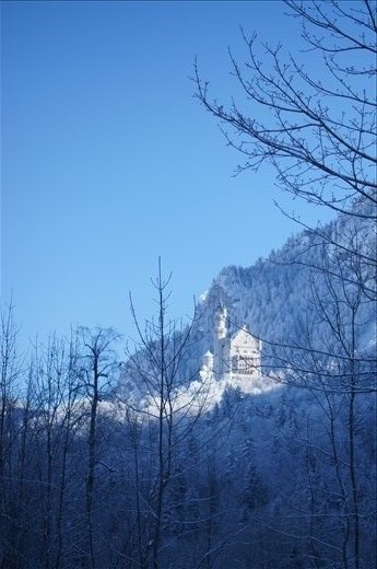 Neuschwanstein Castle more magical when surrounded my snowy mountains and sun