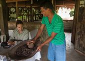 We are shown by our guide Eric, how they grind cocoa seeds to make chocolate.: by sachinv, Views[592]