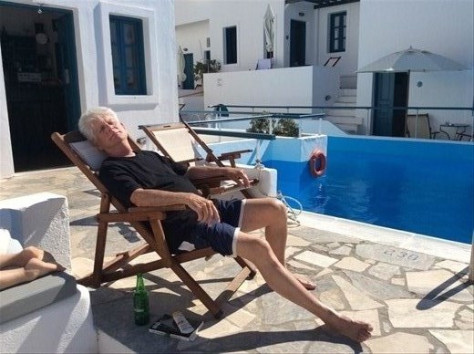 Poolside, relaxing after a hard days walk. Our apartment is in the background.