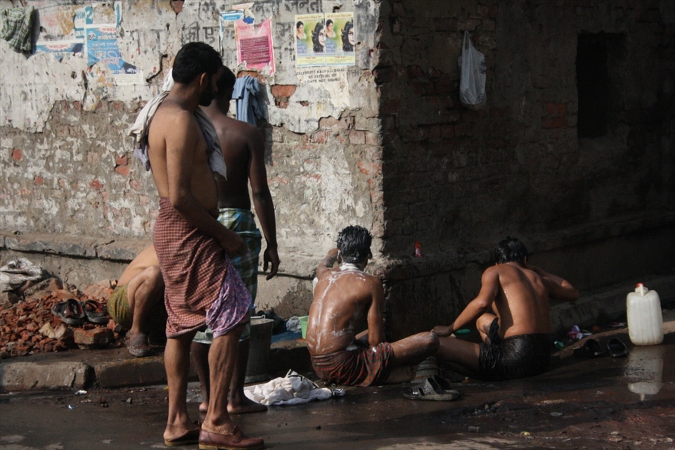 Street bathing in Kolkatta, India,