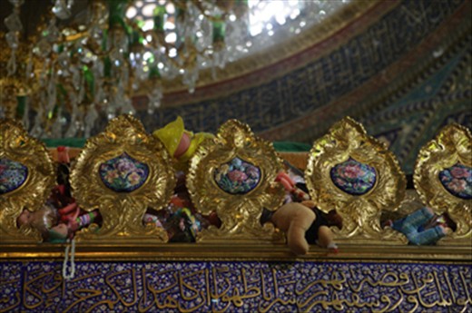 Sayyedah Rokaya's ornate shrine covered in toys as offereings