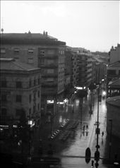 Afternoon, rain in Salamanca. One of the main streets of the city leading to Plaza Mayor. A boy rushes to his home.: by salamanca, Views[348]