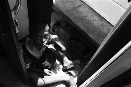 Photo #2 - THE INTRODUCTION

“Everyone smokes in Indonesia,” an Indonesian friend once told me.

I was to feel the full extent of his statement on my first trip to this beautiful country a few months ago.
The freeloader hadn’t outgrown short pants, but was already a chain smoker.