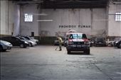 A man sweeping the floor of a parking garage as the day ends in Buenos Aires.: by sanja, Views[842]
