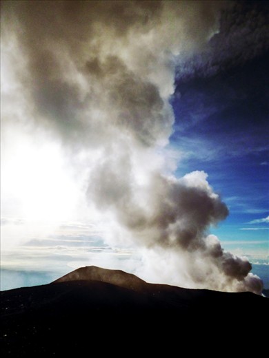 Nuees ardante or pyroclastoc flow from the crater of Mount Semeru, the highest mountain in Java, Indonesia. The top called Mahameru, the peak of the Gods. 