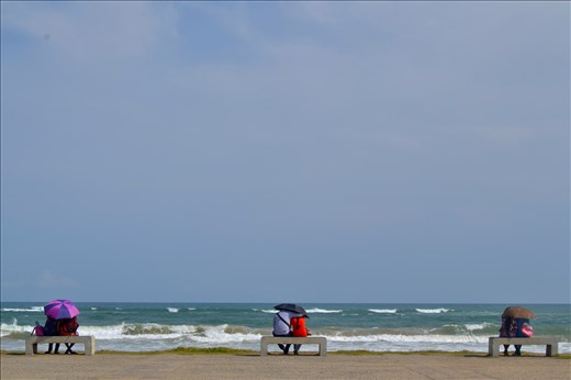 It's sunny, don't forget your umbrella and listen the ocean with your love.