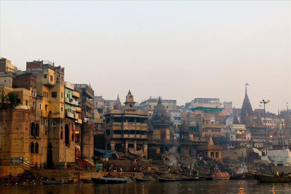 Burning ghats facilitating cremation ceremonies for pilgrims.