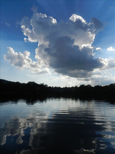 This photo expresses the force of nature.I took it on the boat on a lake.