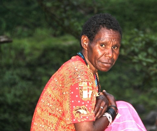 A mother from Amungme tribe enjoying an evening at Banti Waa (valley) , Papua