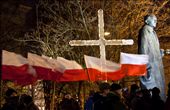 The statue of political activist Roman Dmowski, one of Poland's national heroes. Together with General Pilsudski he helped Poland gain independence from Russia, Prussia and Austria in 1918. Pictured here with a line of Polish flags and the Catholic cross, symbols important to the Polish nation.: by sashastowe, Views[1265]