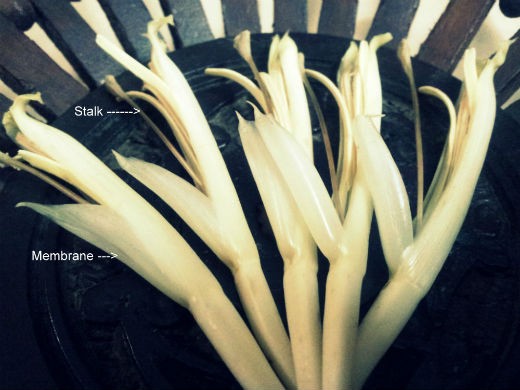 Banana florets with stalk and membrane that should be removed