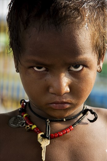The anger, the frustration and a dim hope that’s what is described in the maximum Indian society but what is worst is the innocence and the beautiful smile lost into the anger. A casual walk even in capital city of the country (Delhi) will through you the thousand examples.  The eyes of the child in the picture transferring the same message even though they should have been filled with happiness and innocence.  They should be cherishing the beauty of the childhood.
