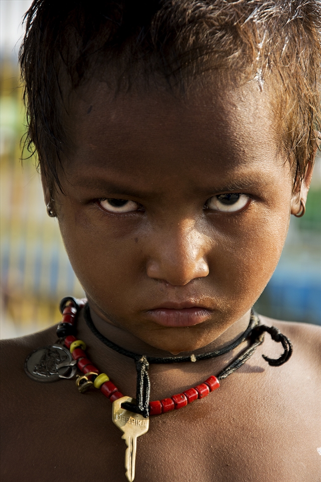 The anger, the frustration and a dim hope that’s what is described in the maximum Indian society but what is worst is the innocence and the beautiful smile lost into the anger. A casual walk even in capital city of the country (Delhi) will through you the thousand examples.  The eyes of the child in the picture transferring the same message even though they should have been filled with happiness and innocence.  They should be cherishing the beauty of the childhood.