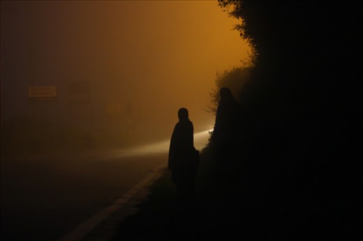Worth the wait: The weather, in Ooty is so unpredictable, it varies throughout the day. These two women, after a long and arduous day of work, look forward to go back home to be reunited with their spouses and children. The local bus (the saving grace) that will take them home is right around the corner.
