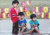 Outside the Ynares Sporting Arena, 3 young boys use their charm to sell some baby ducklings to people entering the venue. However, no such luck.: by sealegs, Views[322]