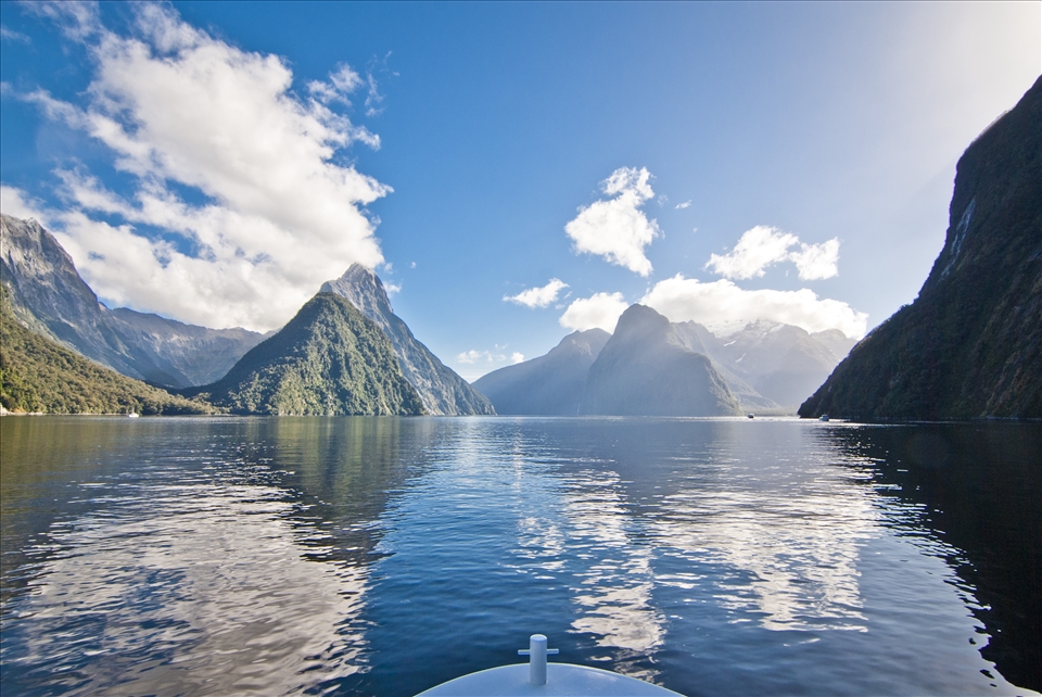 Milford Sound is a must-go place when you visit Fiordland National Park, located in South West of New Zealand.  Milford Sound is a fjord and it only has few sunny days in a year as it's known as the wettest inhabited place in New Zealand, depends on one's luck. The sound gives a great mirror effect panoramic view.