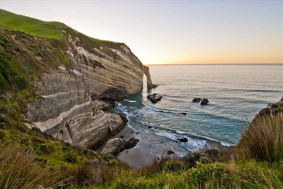 Cape Farewell, located west of Farewell Spit and 160km from Nelson, which is the headland of South  Island New Zealand. I paid my visit days before I departed to my homeland, Malaysia. I guessed it was destined, so that I could have a good farewell with New Zealand, a land full of wonders! One need days to see it, but needs a lifetime to understand it. From the moment I step out from the door (literally, the rock arch of Cape Farewell), hope to see you again in future, New Zealand.
 
