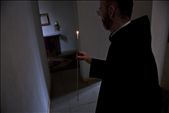A candle is ignited and walked past each monk whilst lighting every candle from the same source of fire: by seandelahay, Views[248]