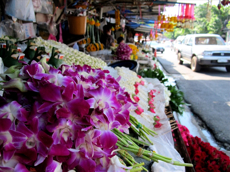 Delicate offerings on a busy road