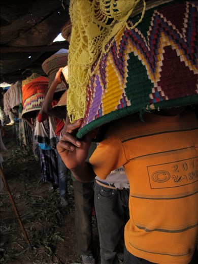 Gifts of Food in baskets carried by boys