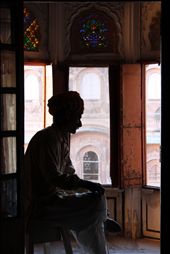 Inside the halls of Mehrangarh fort in Jodpur , I aimed to capture the unique silhouette of this guard at his post and liked how his body sat amongst different lights reflecting from the bright hollow courtyard outside , the soft interior and his shadowy outline. : by sebmendez92, Views[837]