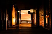The sunrise illuminates a small passage next to a popular dining location.: by sebriebolge, Views[252]