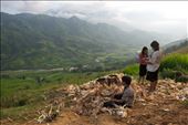 A young boy sits and stares at the possibilities of what could be with his life whilst helping his sisters prepare corn to be sold.: by sebriebolge, Views[253]