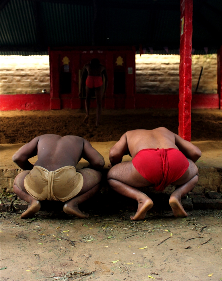 The warrior devotees take blessings from deities before they fight.
