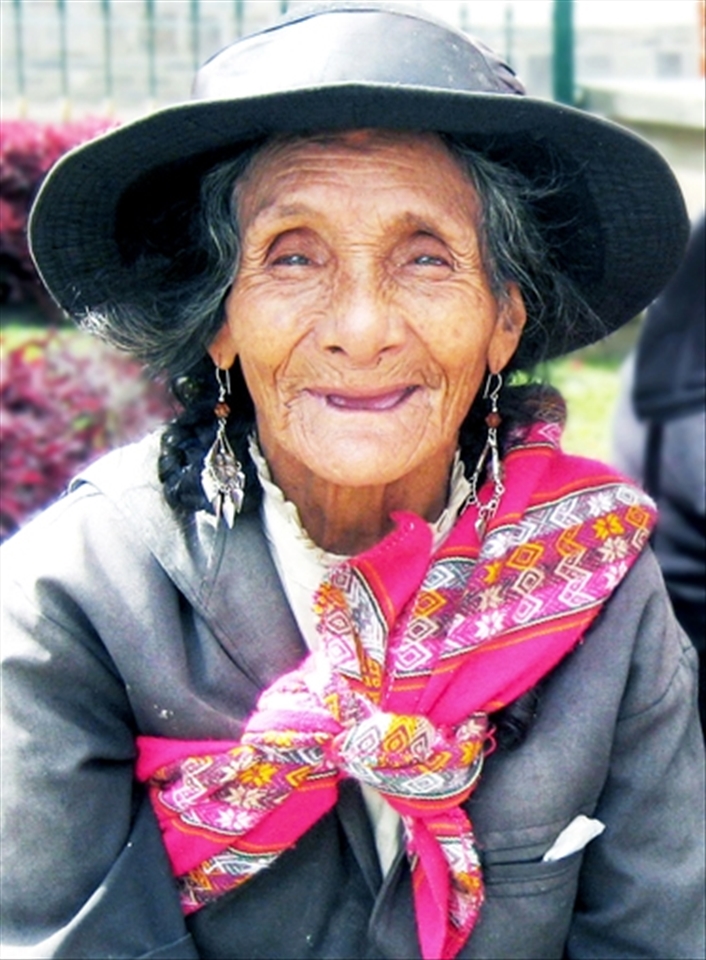 Lady with soul

I met this woman in Huaraz, Ancash in Peru. Although, she spoke Quechua and I spoke Spanish, we understood each other quite well. She was already 92 years old and didn't loose her smile for anything.