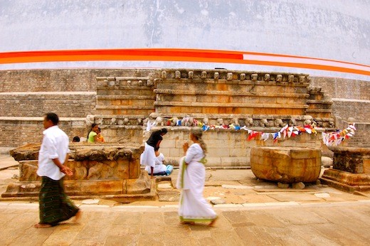 Worshipers circumnavigating a Stupa in Anaradhapura.
