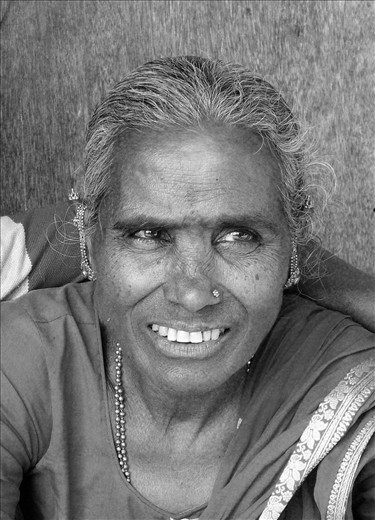 Dharavi - Mumbai - Grandmother looking down the street