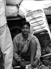 Dharavi - Mumbai - Young father recycling trashes: by serialtraveller, Views[219]