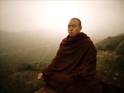 A Tibetan monk on Vultures Peak, India
