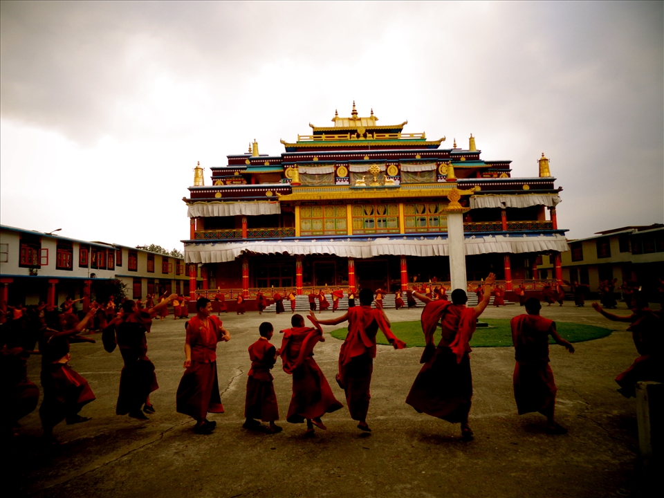 Tibetan monks dancing in Ralang, India