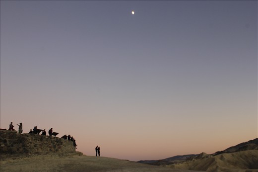 Dancing in the moon light, As a I looked around the erratic terrain, the bad lands of Death Valley. A couple held each other in an intense dialogue and I saw an orchestra waiting to play waiting to play their symphony.