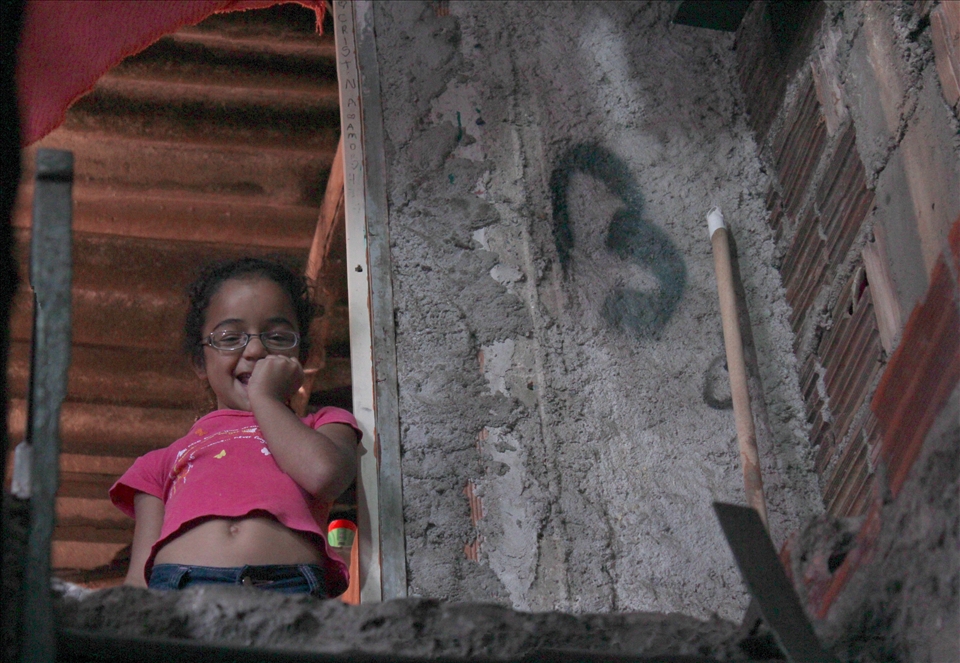 She shares the small house with 5 other members of the family. 