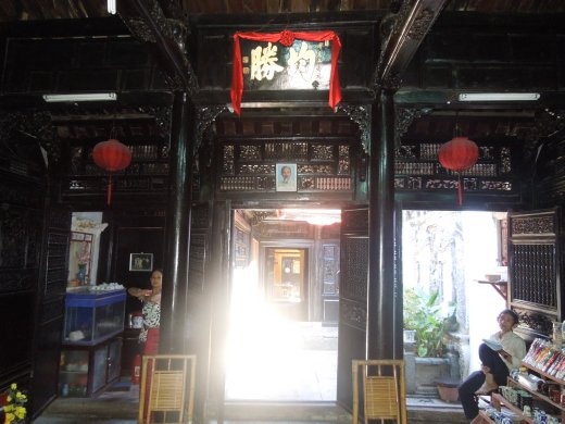 Touring one of the Ancient Houses of Old Town Hoi An... made out of gorgeous teak wood and hundreds of years old