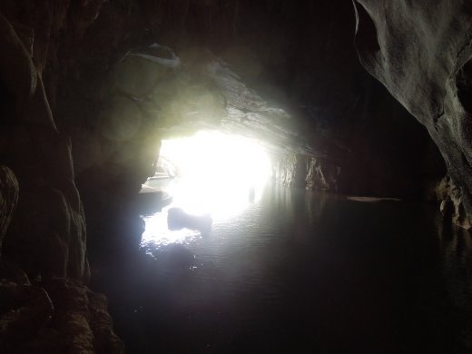 Headed back towards the mouth of the cave on foot. We catch our boat after a short hike along the bank to a dock.