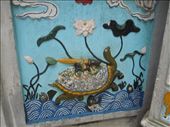 The temple was full of these ceramic reliefs- this one depicting the legend of the sword coming out of the lake on the back of the turtle god: by sglass, Views[279]