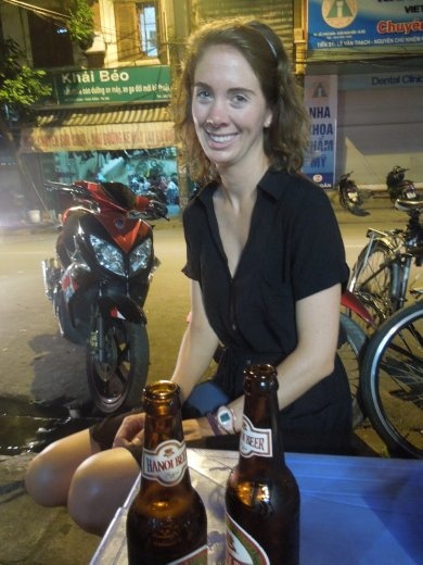 Sitting outside on our little plastic stools at our little plastic table-- a very common past time here